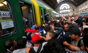 Refugees in Budapest, Hungary. Source The Guardian.