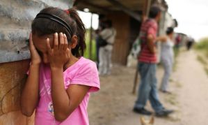 Central America. A young girl cries as her home and neighborhood are forcefully dismantled in a shanty town after the government claimed that the settlement was illegal. Photo Spencer Platt Getty