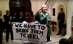 a-black-lives-matter-activist-silently-protests-hillary-clinton-at-a-funraiser-in-south-carolina-photo-source-salon