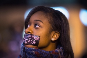 ST. LOUIS, MO - MARCH 14: Ferguson activists march through downtown during a protest on March 14, 2015 in St. Louis, Missouri. St. Louis and the nearby town of Ferguson have experienced many protests, which have often been violent, since the death of Michael Brown who was shot and killed by a Ferguson police officer in August. On Wednesday evening two police officers were shot while they were securing the Ferguson police station during a protest. (Photo by Scott Olson/Getty Images)